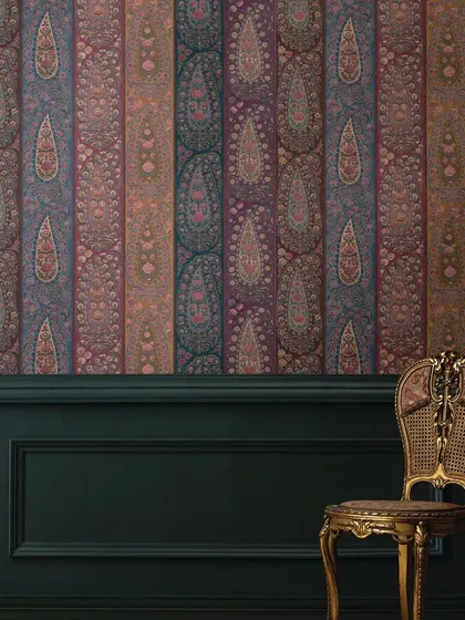 This striking wallpaper from the Sabyasachi collection features vertical panels of paisley motifs in a rich, multi-tonal palette. It’s a bold and artistic choice that brings a sense of history and grandeur to the walls.