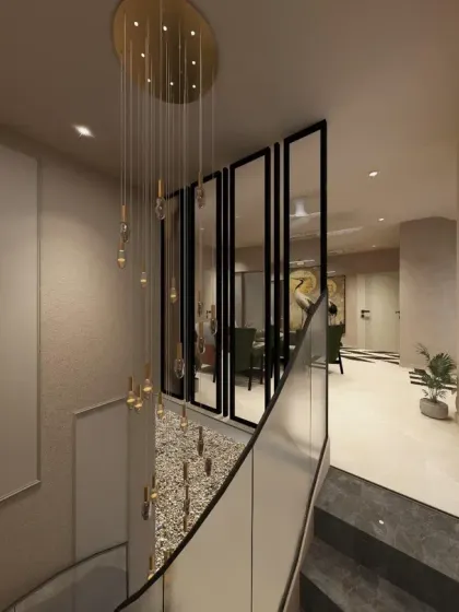 This angle shows the double-height space of the staircase, with the cascading chandelier and textured walls creating an elevated experience.