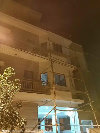 An overall view of the residential project under construction, showing the multi-level structure and the ongoing work to bring the architectural design to life.