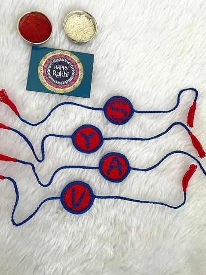 I also offer personalized Rakhis with initials. This set was for four brothers, with each Rakhi featuring their first initial.