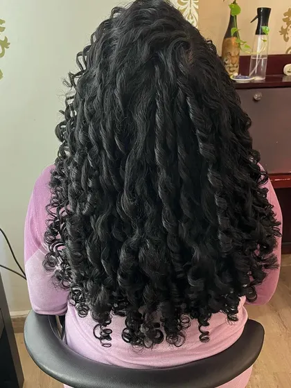 A curl transformation for Jeevitha. I work with each client's unique curl pattern to create the best shape.