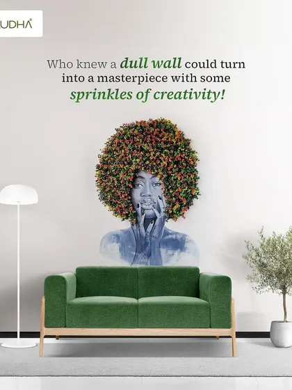 Who knew a dull wall could become a masterpiece? Here, the same floral afro art piece is shown in a living room setting, acting as a vibrant and creative focal point above a modern green sofa.