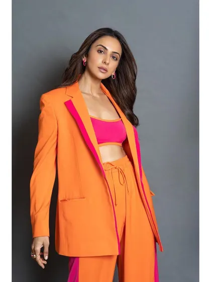 Another view of this amazing color-blocked suit. It's a look that's impossible to ignore.