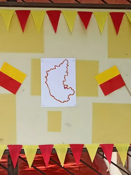 Another decoration for Kannada Rajyotsava, featuring the state map and flag.
