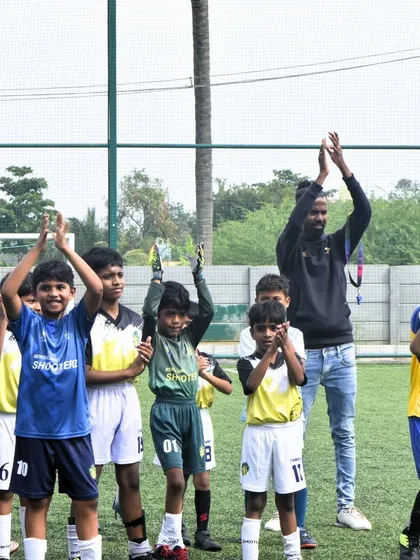 Celebrating our U-9 team's championship win at the Mega International Football Tournament. These moments of victory are what our young athletes train for.