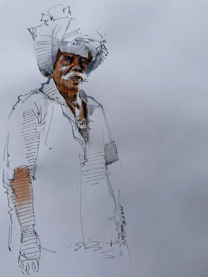 The finished pen and watercolor sketch of a man, a great example of quick and effective illustration.