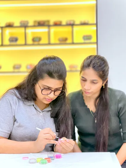 One of our expert trainers providing one-on-one guidance to a student. This personalized attention is a cornerstone of our teaching philosophy.