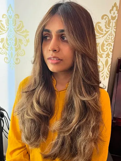 The final look is glamorous and full of life.