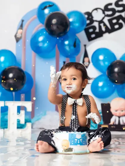 Getting down to business with the cake! A messy and fun cake smash moment from our 'Boss Baby' theme.