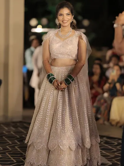 A duplicate of image 72, showing the full sangeet look.