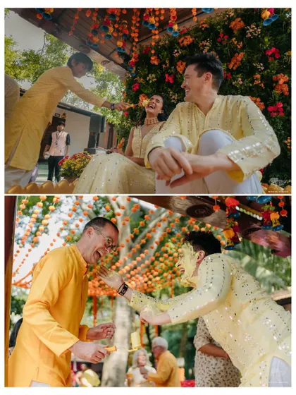 A playful moment during the Haldi ceremony. The couple and their guests share a laugh, capturing the fun and relaxed spirit of the day.