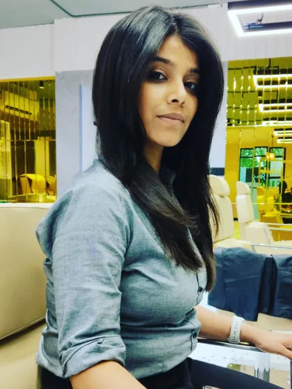Another angle of this gorgeous, multi-layered haircut. It's a versatile style that looks great whether worn straight or with waves.