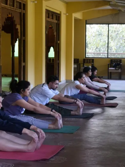 A moment of focused stretching during our Dehradun retreat. It's beautiful to see everyone moving together, each on their own personal journey but sharing the same space and energy.