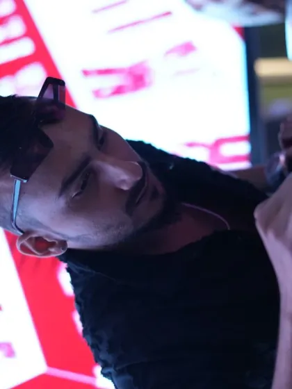 A close-up shot of me fine-tuning a mix. Every transition is crafted to maintain the party's momentum.