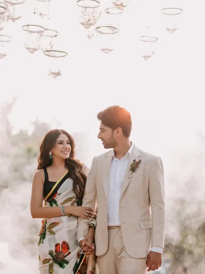 A dreamy, romantic shot of Armaan Malik and Aashna Shroff during their engagement. The soft light and natural setting create an ethereal atmosphere, perfect for capturing the magic of new beginnings.