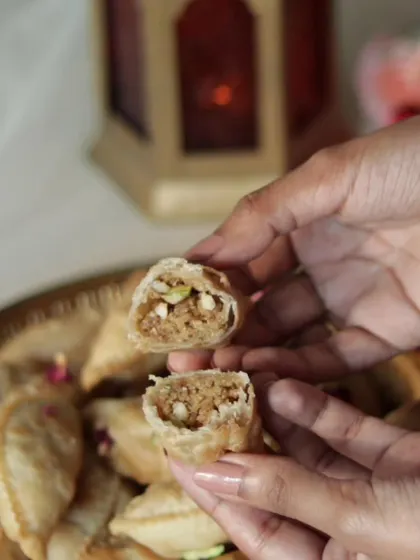 The heart of my Nutty Gujiya, showing the rich, homemade mawa and nut filling. This is my mom's recipe, a taste of my North Indian roots.