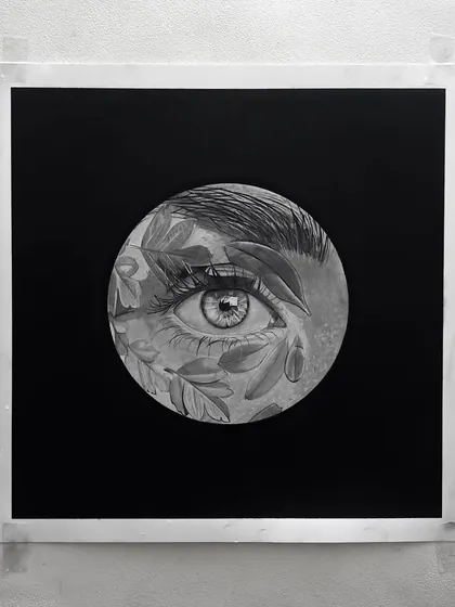 A surrealist piece from my eye series, combining a realistic eye with natural leaf elements.
