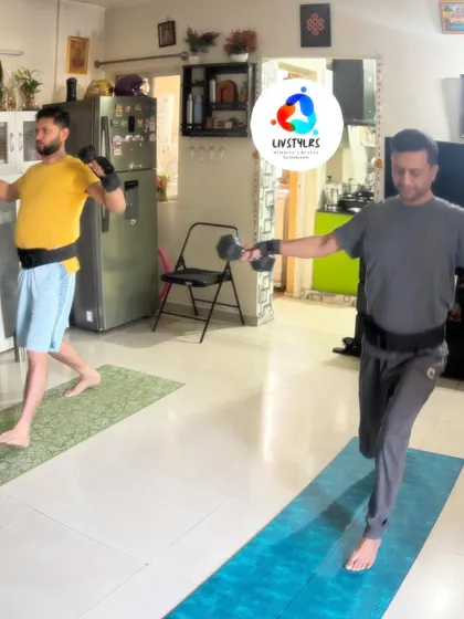 Two clients work on dumbbell lunges, a fundamental exercise for building leg strength and stability. I ensure proper form to maximize results and prevent injury in every session.