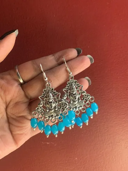 The silver version of my popular Lakshmi earrings, shown here with bright blue beads. The colour of the beads is fully customisable.