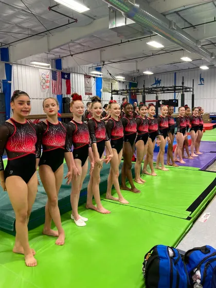 Our Women's Development Program teams lined up and looking professional at their last invitational before State.