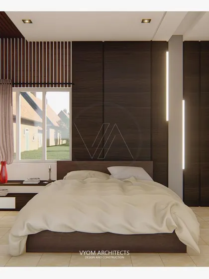 A master bedroom featuring a dark wood-paneled wall with integrated vertical lighting. The design creates a warm, sophisticated, and restful ambiance, perfect for a private sanctuary.