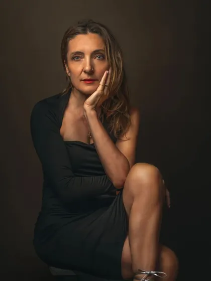 A duplicate of image 78, this portrait is a testament to the power of simplicity. The focus is entirely on the subject's expression and poise, creating a strong and captivating image.