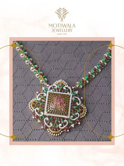 A unique and artistic necklace featuring intricate filigree work and a central motif with rubies and emeralds. This piece is a modern tribute to traditional Indian craftsmanship.