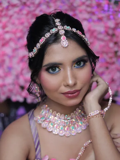 A soft and pretty portrait. The makeup is blended perfectly to create a flawless yet natural-looking complexion.