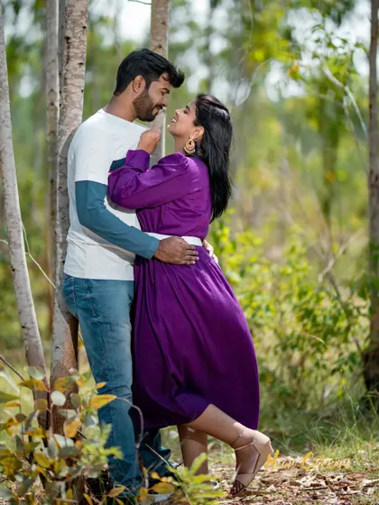 A duplicate of ID 71, this shot captures a dynamic and loving interaction between a couple in a forest setting.