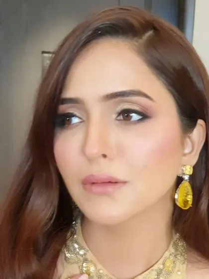 A side profile of Sonam's event makeup. This angle highlights the soft contouring, glowing skin, and the way the eye makeup is blended for a seamless, elegant finish.