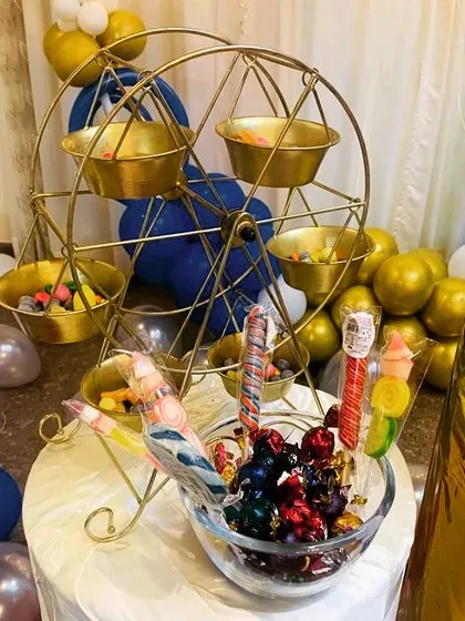 This miniature ferris wheel is one of our most popular props for dessert tables. We fill it with candies and sweets, adding a fun, interactive element that both kids and adults enjoy.