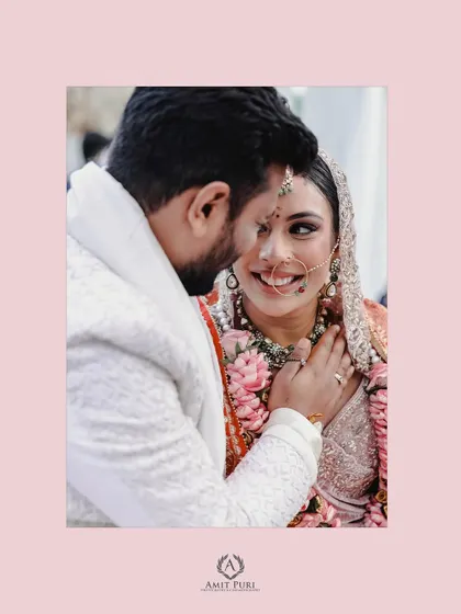 A close-up portrait capturing the tender look between the bride and groom. The image focuses on their expressions and the emotional connection on their wedding day.