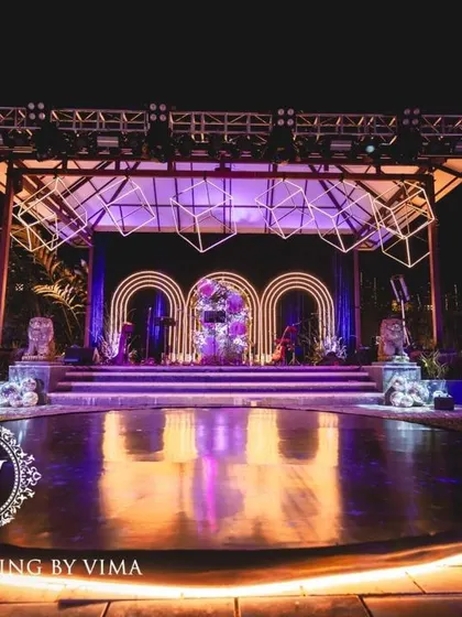 A neon-themed stage setup for a 70th birthday celebration. The dynamic lighting and modern stage design created a high-energy atmosphere perfect for a milestone party.