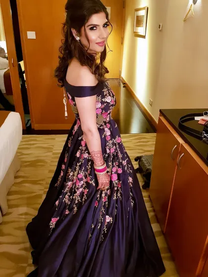 A full-length shot showing off the beautiful floral embroidered gown, perfect for a cocktail or sangeet event.