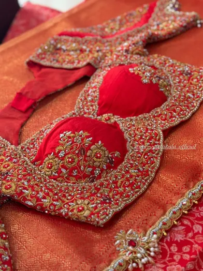 Another view of the front of the red blouse.