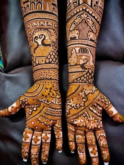A traditional design with a mix of swan, elephant, and peacock motifs, creating a rich and varied pattern.