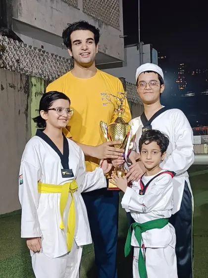 Another photo with my students and their trophy. These moments create memories that last a lifetime.