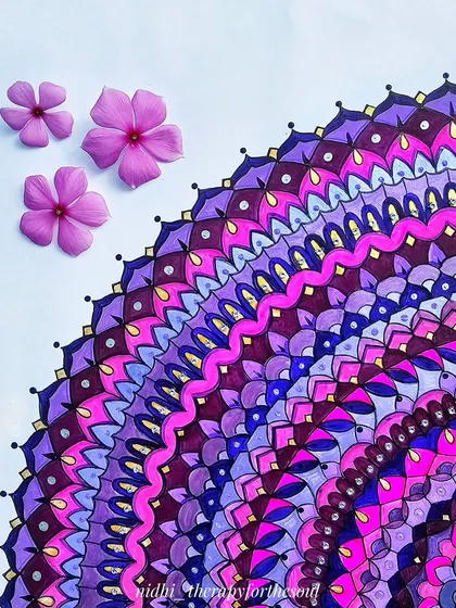 A detailed corner of the magenta mandala, with a few matching flowers to highlight the color palette. This shows the fine dot work and patterns up close.