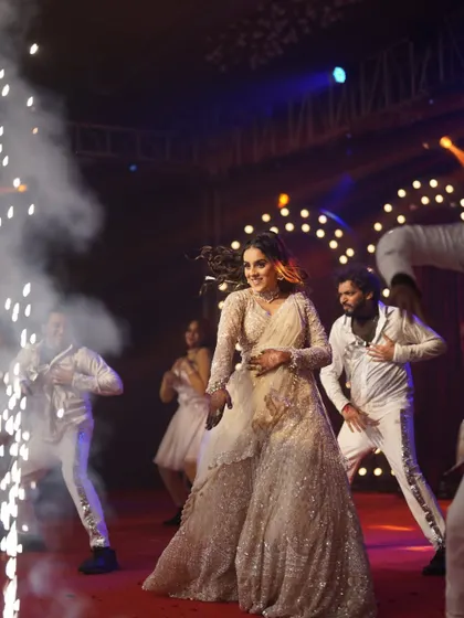 The bride's solo performance, complete with cold pyro, making her look and feel like a true star.