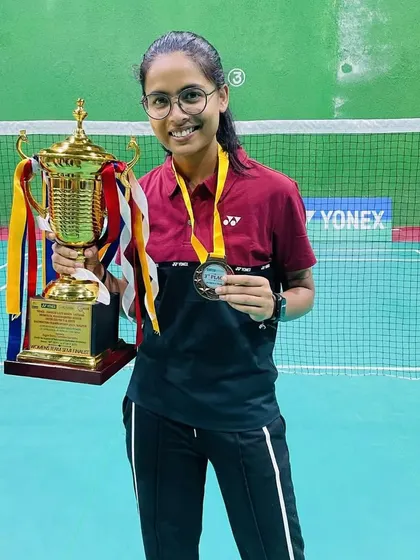 Prishita with her trophy and medal from the State Championship. Competing and winning at this level is a major milestone.