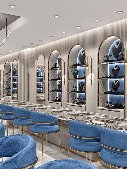 A render of the diamond section, where we used a cooler color palette with shades of blue to complement the brilliance of the diamonds. The arched displays and plush blue chairs create a distinct and sophisticated zone within the store.