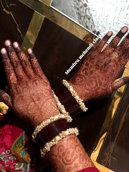The stain on this bridal design is so rich, especially with the beautiful bangles. My henna cones are available for you to achieve this color too!
