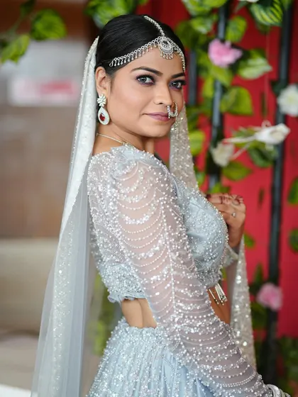 A side profile of the modern bridal look, demonstrating how to create a balanced and elegant silhouette with hair and makeup.
