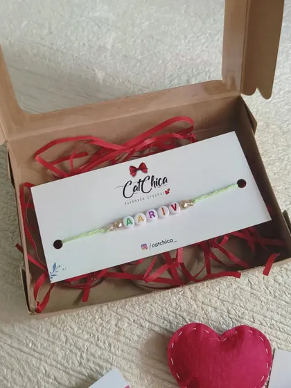 Our custom name bracelet makes for a perfect, affordable Rakhi. This one for Aariv is packaged in a gift box, ready for the festival of bonding.