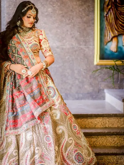 This multi-color paisley embroidered lehenga offers a unique and artistic look for a bride who wants something different from the traditional red.