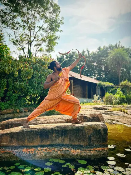 A skilled archer becomes one with the target. This posture, rooted firmly on the earth, demonstrates the stability and focus required to achieve true aim in traditional field archery.