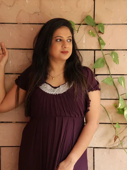 A thoughtful pose from an outdoor portrait session. I used subtle makeup to create a natural and polished look that is perfect for professional or personal branding photos.