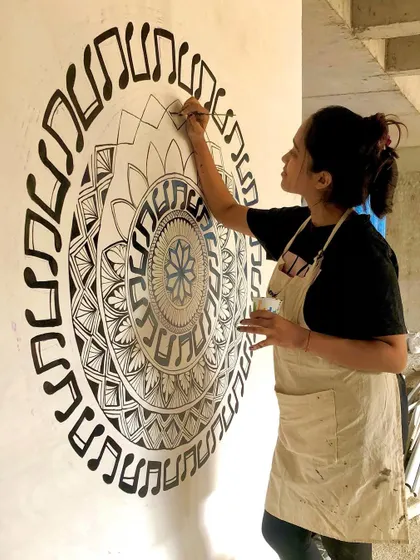 A work in progress shot of the music themed mandala, showing the early stages of filling in the patterns.