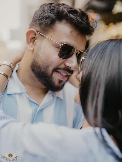 An intimate close-up of a couple, framed to feel personal and close even in a public space. This highlights my ability to create a sense of privacy and romance anywhere.