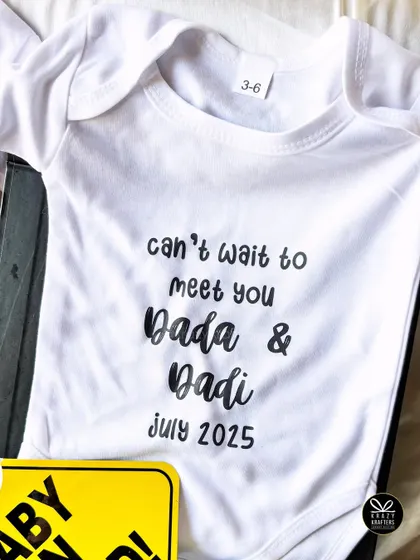A custom onesie for 'Dada & Dadi' is a simple yet incredibly touching way to announce that a new member is joining the family.